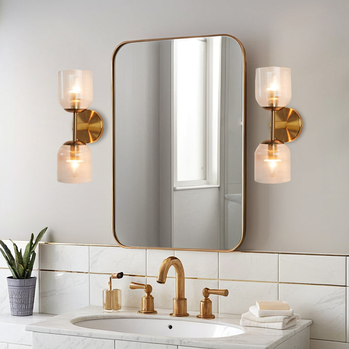Antique Bronze Double Sconce with Ribbed Glass Shades and Bell-Shaped Design for Durable Indoor Lighting