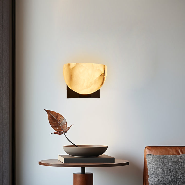 Engraved Elegance Alabaster Sconce: Handcarved Alabaster Wall Light with Globe-like Contours and Burnished Brass for Living Room, Kitchen, or Bedroom Wall Lighting