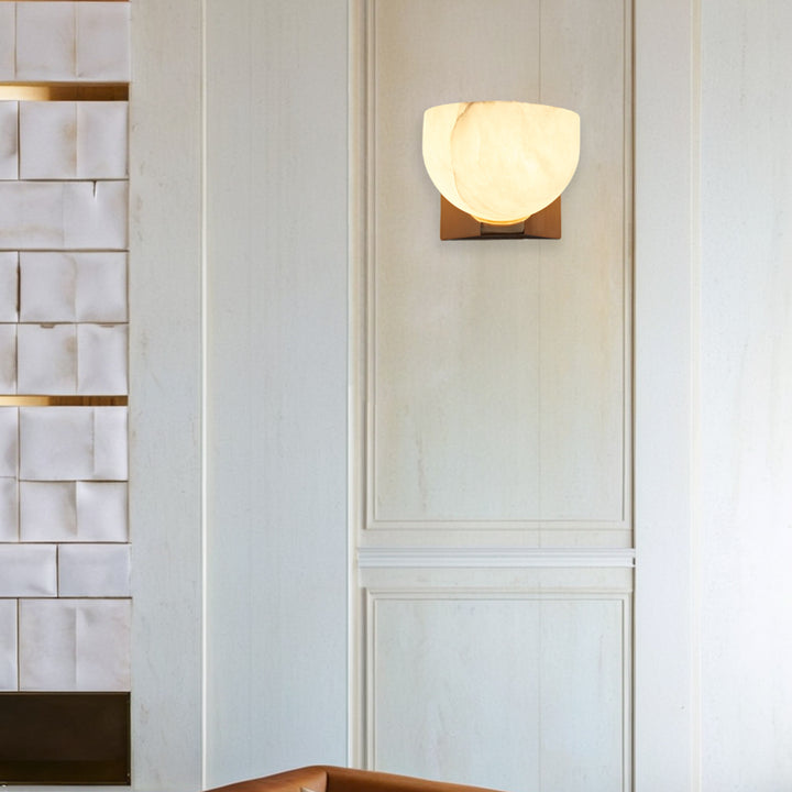 Engraved Elegance Alabaster Sconce: Handcarved Alabaster Wall Light with Globe-like Contours and Burnished Brass for Living Room, Kitchen, or Bedroom Wall Lighting
