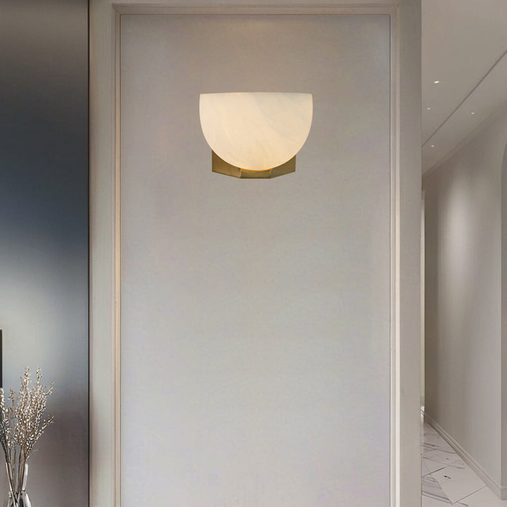 Engraved Elegance Alabaster Sconce: Handcarved Alabaster Wall Light with Globe-like Contours and Burnished Brass for Living Room, Kitchen, or Bedroom Wall Lighting