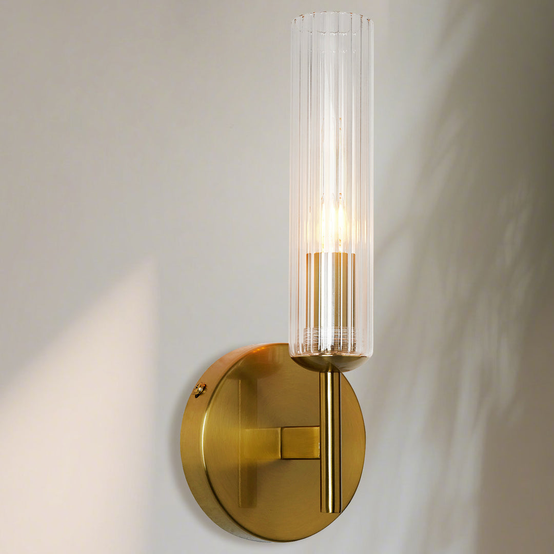 Antique Bronze Tube Sconce with Ribbed Glass Shade and Cylindrical Design for Versatile Indoor Lighting