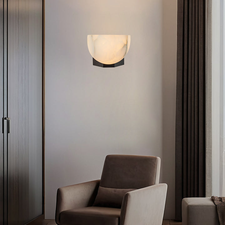 Engraved Elegance Alabaster Sconce: Handcarved Alabaster Wall Light with Globe-like Contours and Burnished Brass for Living Room, Kitchen, or Bedroom Wall Lighting