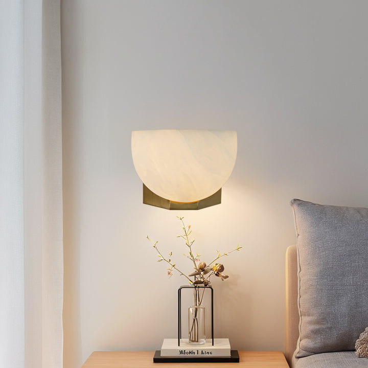Engraved Elegance Alabaster Sconce: Handcarved Alabaster Wall Light with Globe-like Contours and Burnished Brass for Living Room, Kitchen, or Bedroom Wall Lighting