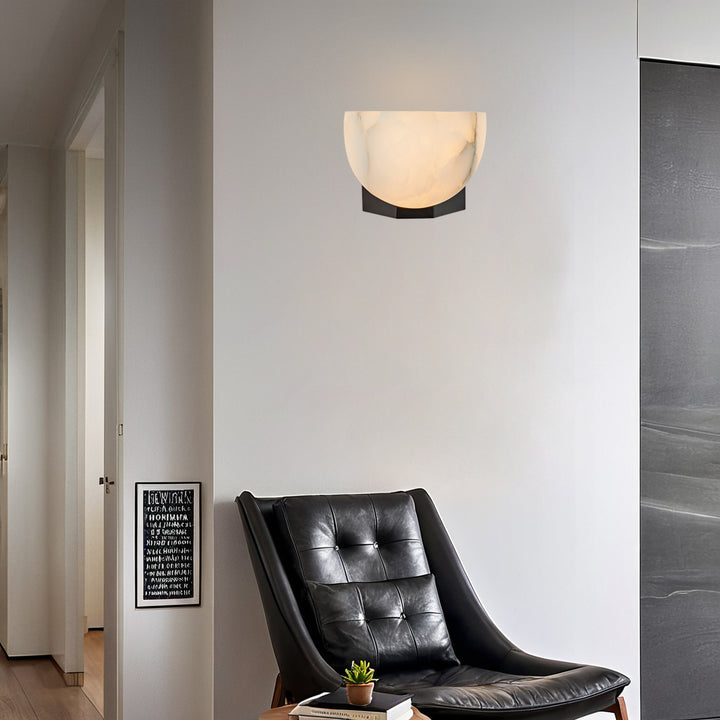 Engraved Elegance Alabaster Sconce: Handcarved Alabaster Wall Light with Globe-like Contours and Burnished Brass for Living Room, Kitchen, or Bedroom Wall Lighting