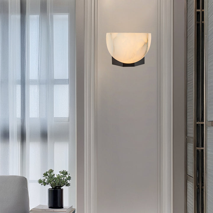 Engraved Elegance Alabaster Sconce: Handcarved Alabaster Wall Light with Globe-like Contours and Burnished Brass for Living Room, Kitchen, or Bedroom Wall Lighting