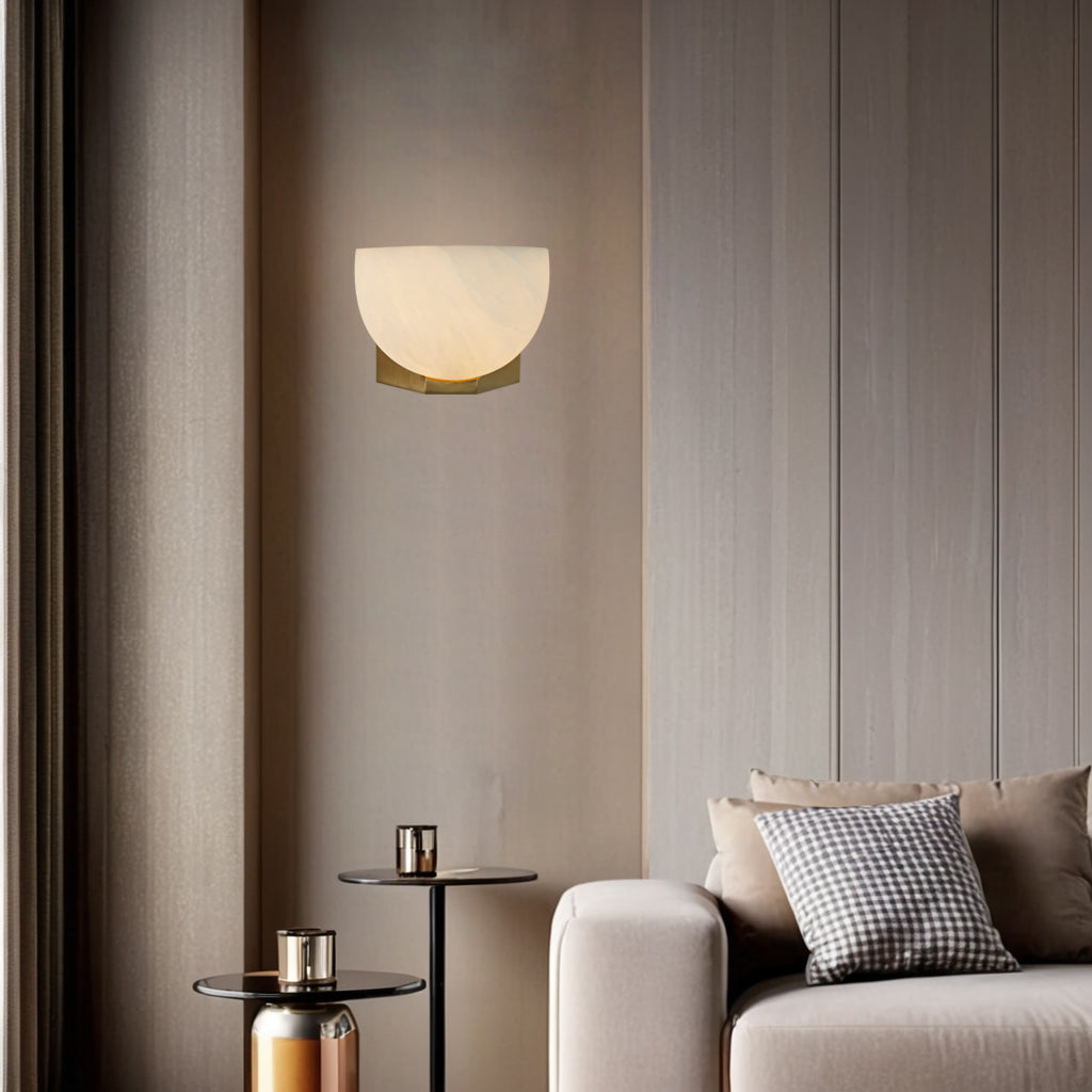 Engraved Elegance Alabaster Sconce: Handcarved Alabaster Wall Light with Globe-like Contours and Burnished Brass for Living Room, Kitchen, or Bedroom Wall Lighting