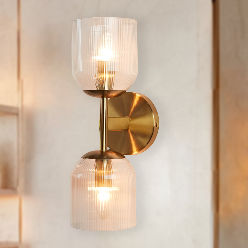 Antique Bronze Double Sconce with Ribbed Glass Shades and Bell-Shaped Design for Durable Indoor Lighting