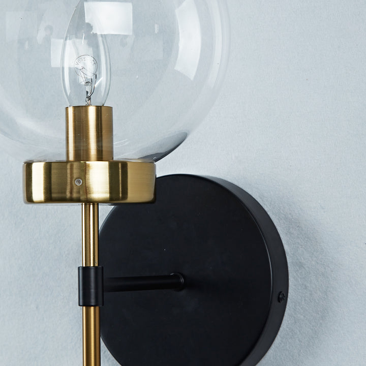 Brass Glow Mid-Century Glass Globe Wall Sconce - Two-Toned Metal and Handblown Clear Glass for Bedroom, Living Room, and Outdoor Lighting