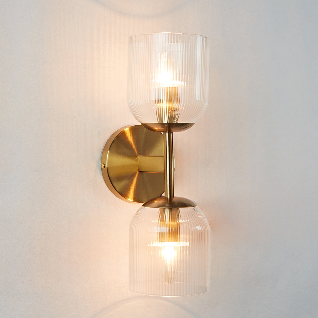 Antique Bronze Double Sconce with Ribbed Glass Shades and Bell-Shaped Design for Durable Indoor Lighting