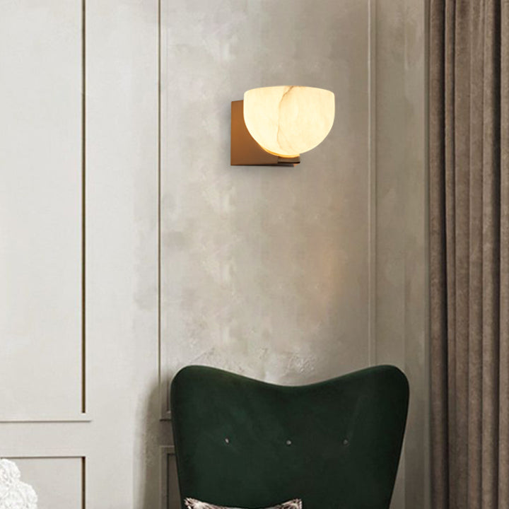 Engraved Elegance Alabaster Sconce: Handcarved Alabaster Wall Light with Globe-like Contours and Burnished Brass for Living Room, Kitchen, or Bedroom Wall Lighting