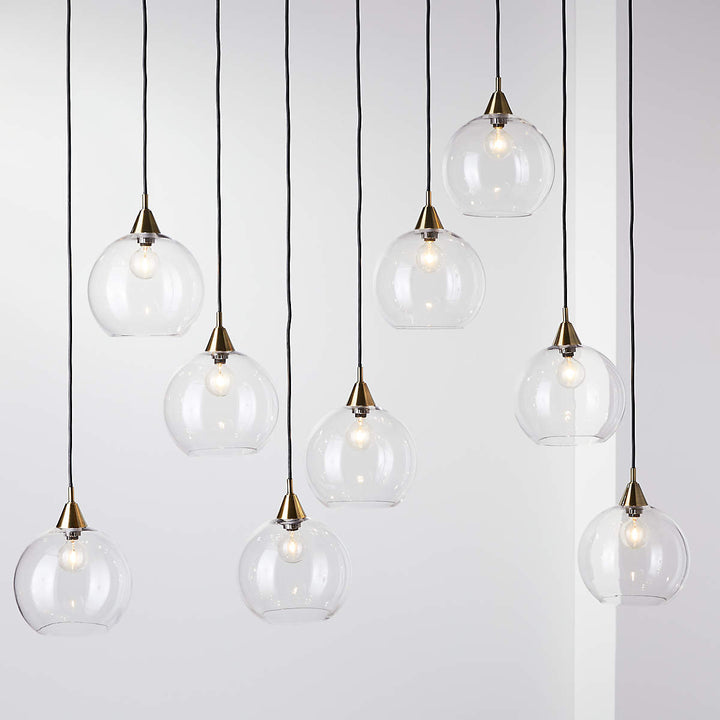 Industrial Modern Glass Globe Pendant - Sleek Chandelier with Clear Glass Shades, Suitable for Dining Room And Living Room