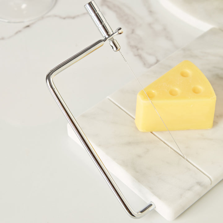 White Marble Cheese Board with Stainless Steel Slicer - Unique Grey Veining and Grooved Design for Dining Room and Kitchen Elegance