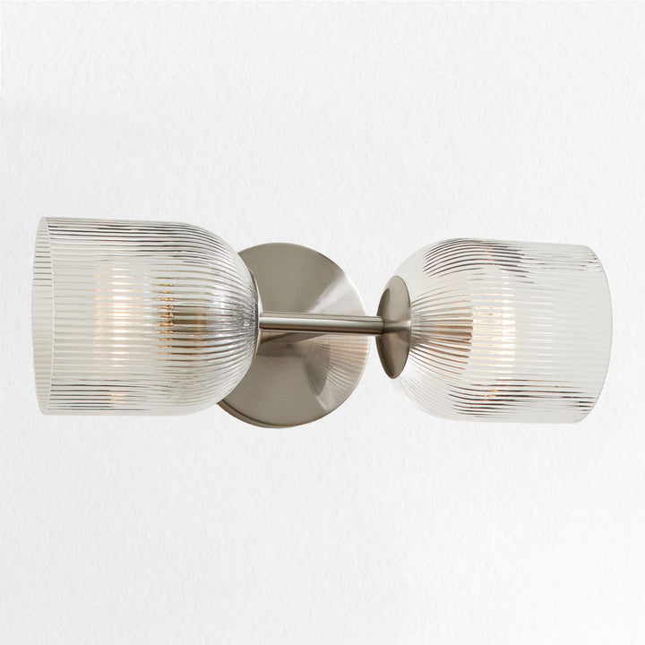 Antique Bronze Double Sconce with Ribbed Glass Shades and Bell-Shaped Design for Durable Indoor Lighting