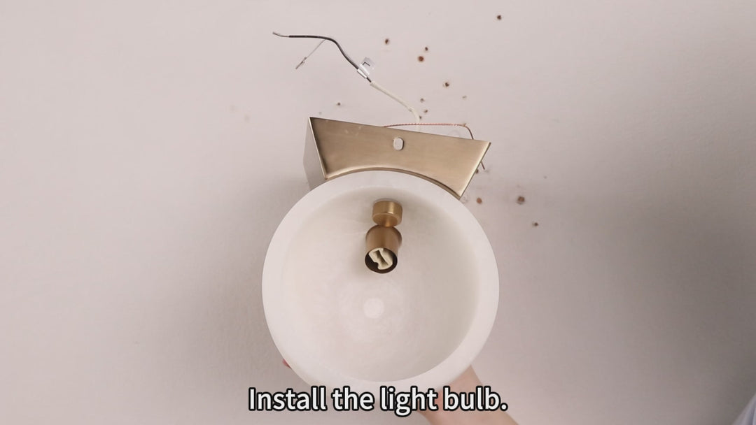 Engraved Elegance Alabaster Sconce: Handcarved Alabaster Wall Light with Globe-like Contours and Burnished Brass for Living Room, Kitchen, or Bedroom Wall Lighting