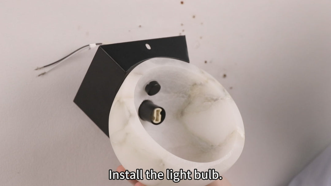 Engraved Elegance Alabaster Sconce: Handcarved Alabaster Wall Light with Globe-like Contours and Burnished Brass for Living Room, Kitchen, or Bedroom Wall Lighting